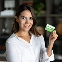 Woman holding credit card